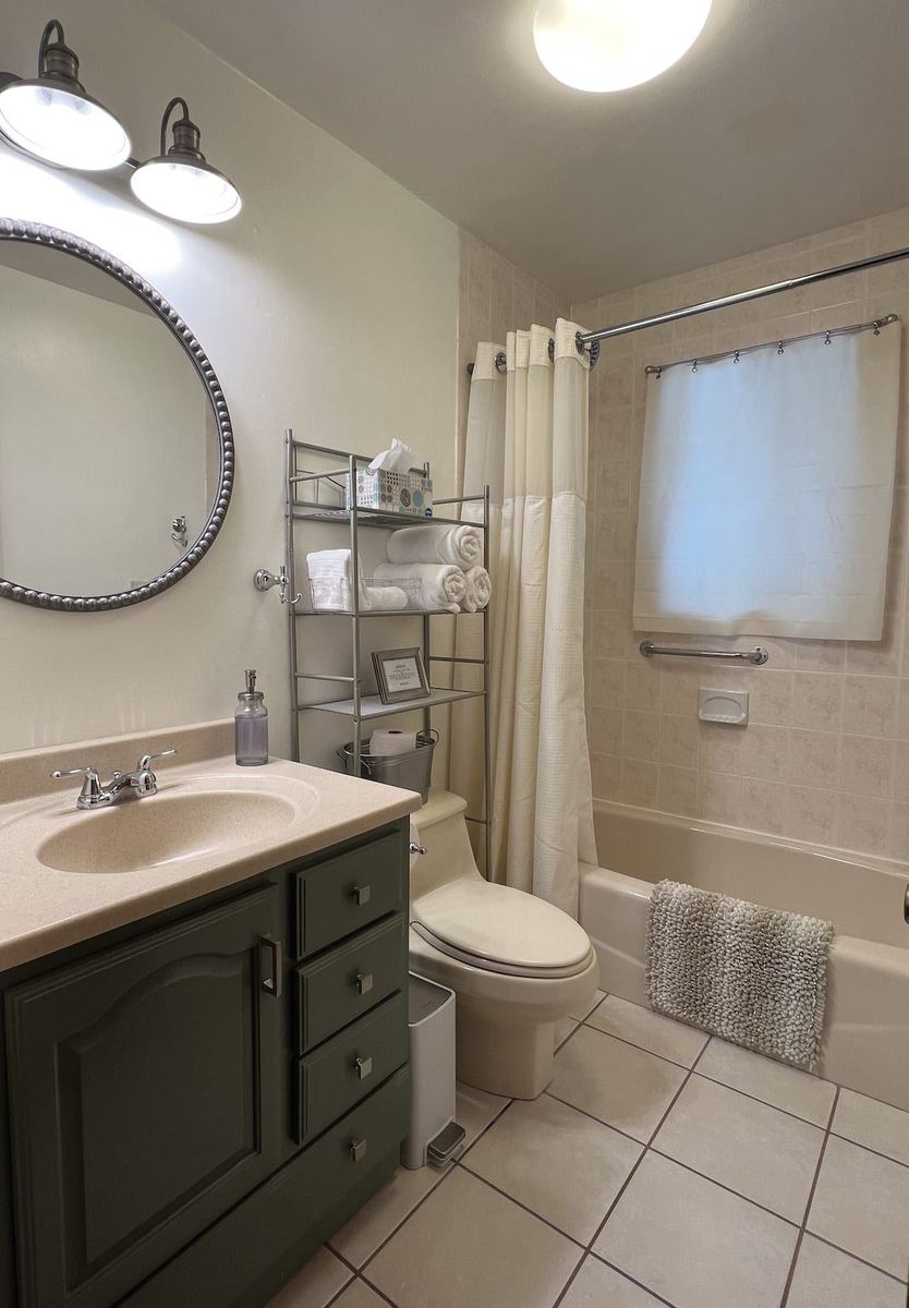Full bathroom with vanity and tub shower