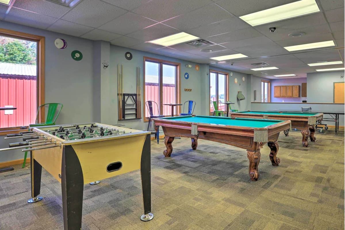 Community game room with pool and foosball tables